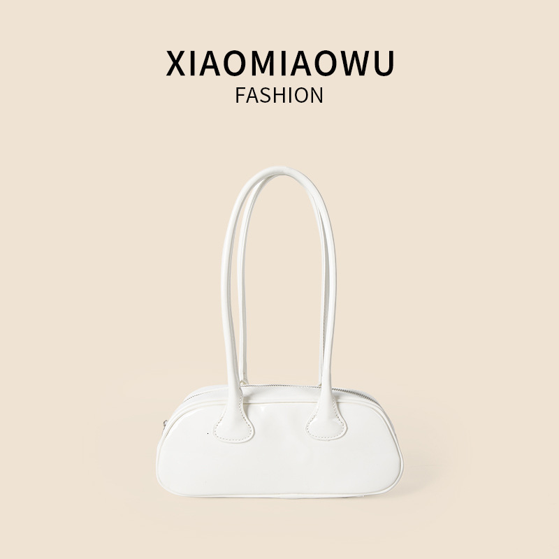 Korean version simple and fashionable solid color shoulder women's high-end feeling, western-style armpit bag, summer new item, niche PU stick ba