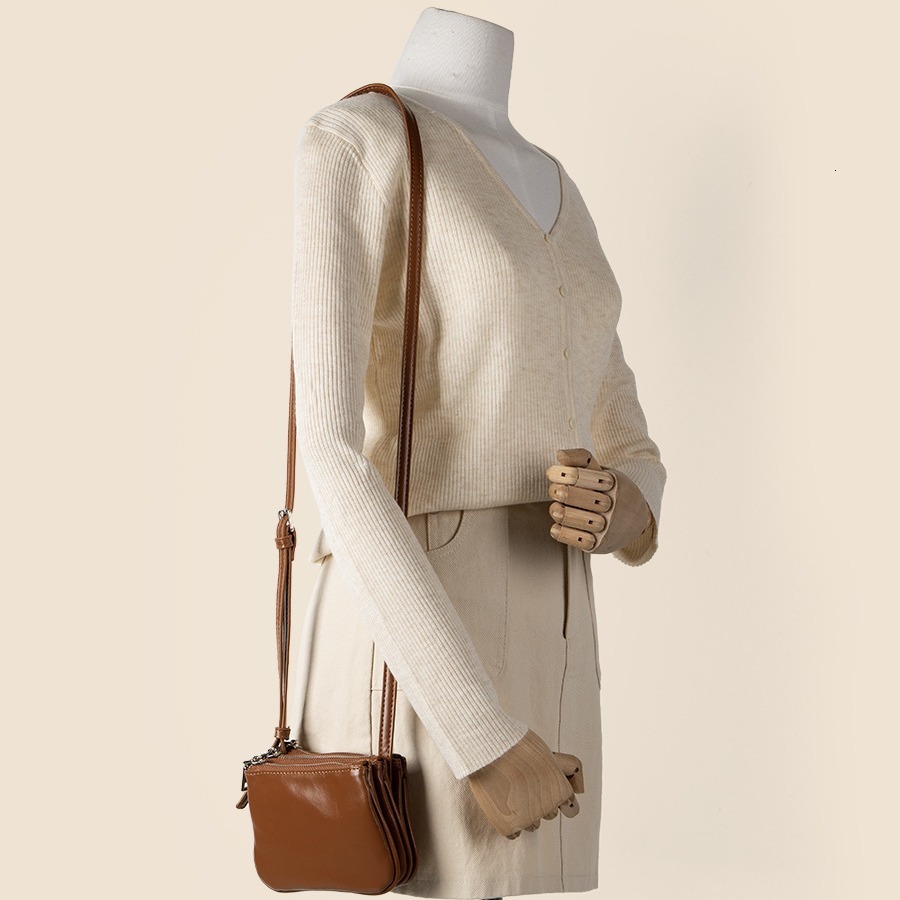 PU solid color single shoulder new small square with multiple pockets, high-end sense, niche and versatile crossbody bag for women in summer