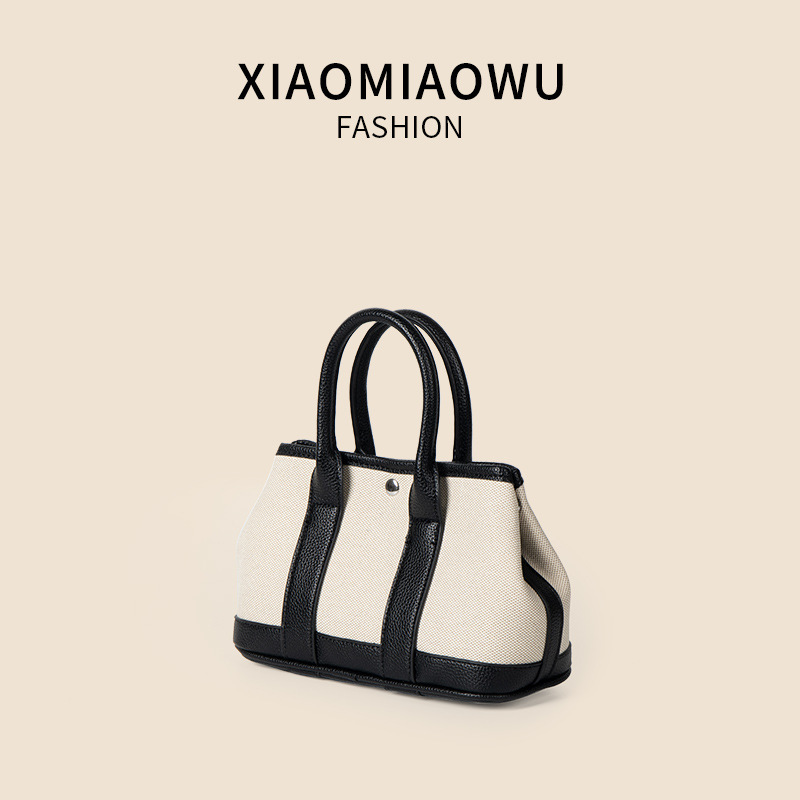 Minimally artistic versatile crossbody canvas shoulder bag, niche summer light luxury high-end women's hand-held vegetable basket bag