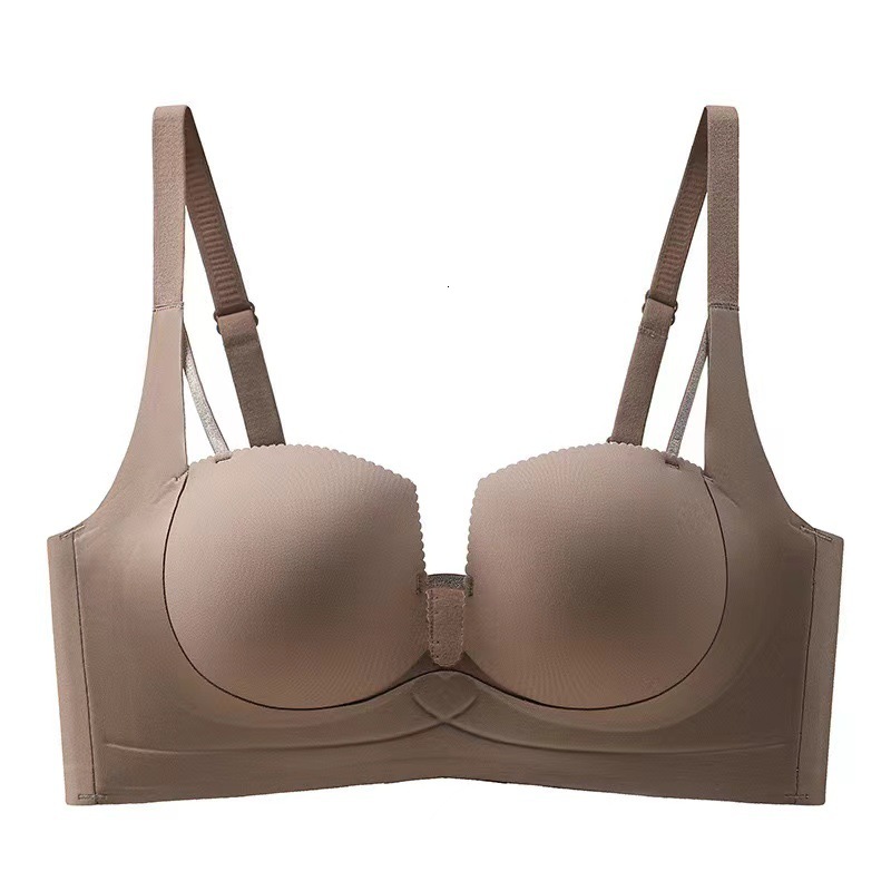 Untouched lingerie for women, with pull tab that gathers small breasts, showing off a large reduction. The accessory breasts are sagging, anti outward