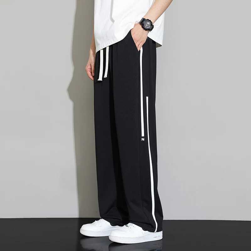 Summer new sports pants mens jogging wide leg pants neutral breathable loose outdoor quick drying fabric fashionable casual pantsW240725