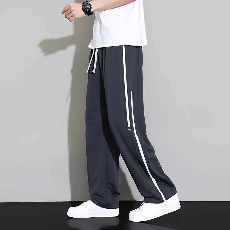 Summer new sports pants mens jogging wide leg pants neutral breathable loose outdoor quick drying fabric fashionable casual pantsW240725