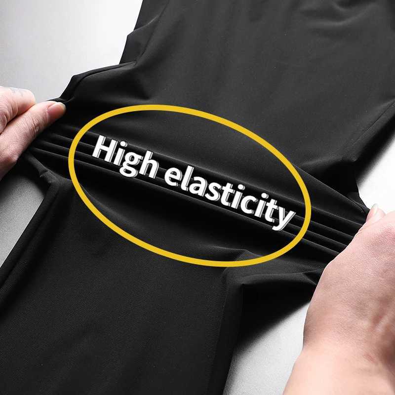 Summer ice silk mens breathable quick drying casual slim pants jogging mens black zipper pocket sports fitness pantsW240725