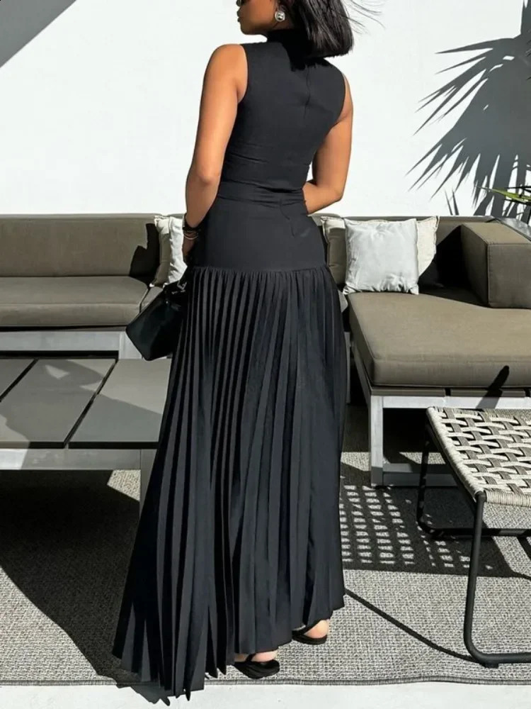 Tinaa Solid Black pleated long dress with plain neck and sleeveless elegant evening gown 240820
