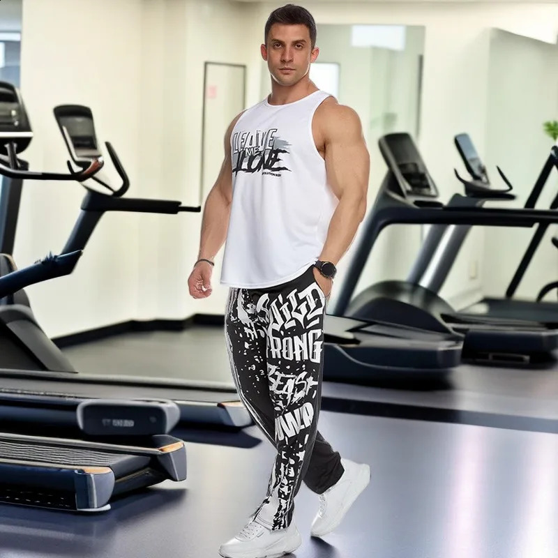 Mens quick drying mesh knitted sports pants lightweight and oversized clothing bottom for runners lace up dye printed casual mens 240821