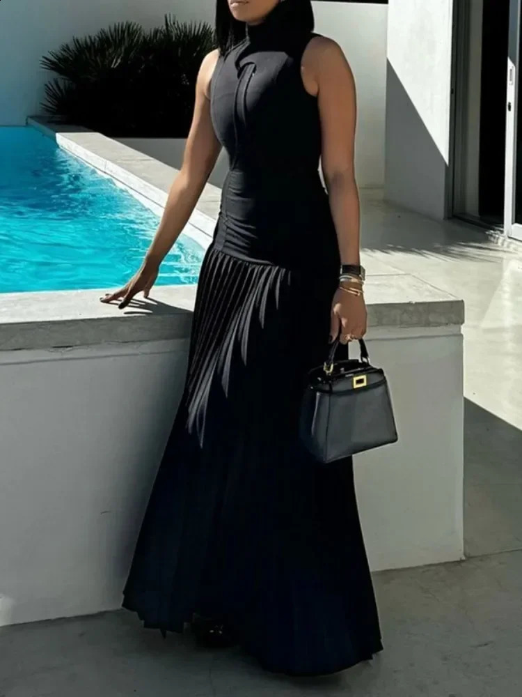 Tinaa Solid Black pleated long dress with plain neck and sleeveless elegant evening gown 240820