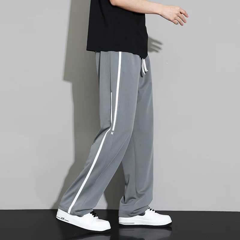 Summer new sports pants mens jogging wide leg pants neutral breathable loose outdoor quick drying fabric fashionable casual pantsW240725