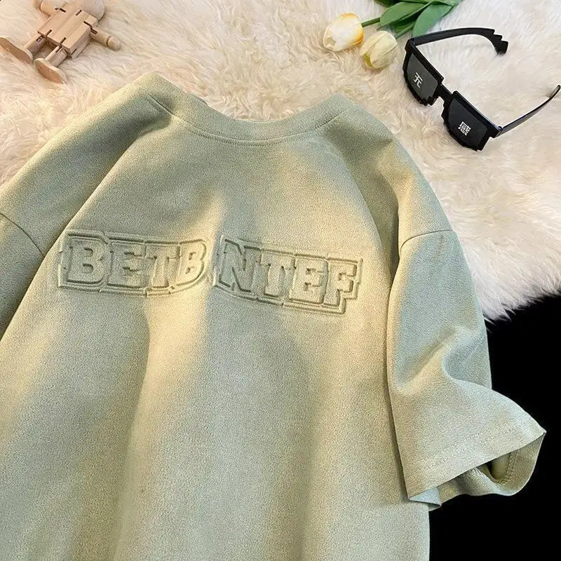 Summer mens and womens fashion personality steel print letter hiphop round neck short sleeved American couple loose casual Tshirt 240821