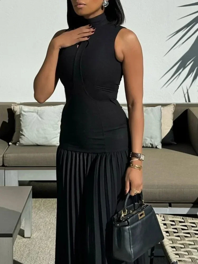 Tinaa Solid Black pleated long dress with plain neck and sleeveless elegant evening gown 240820