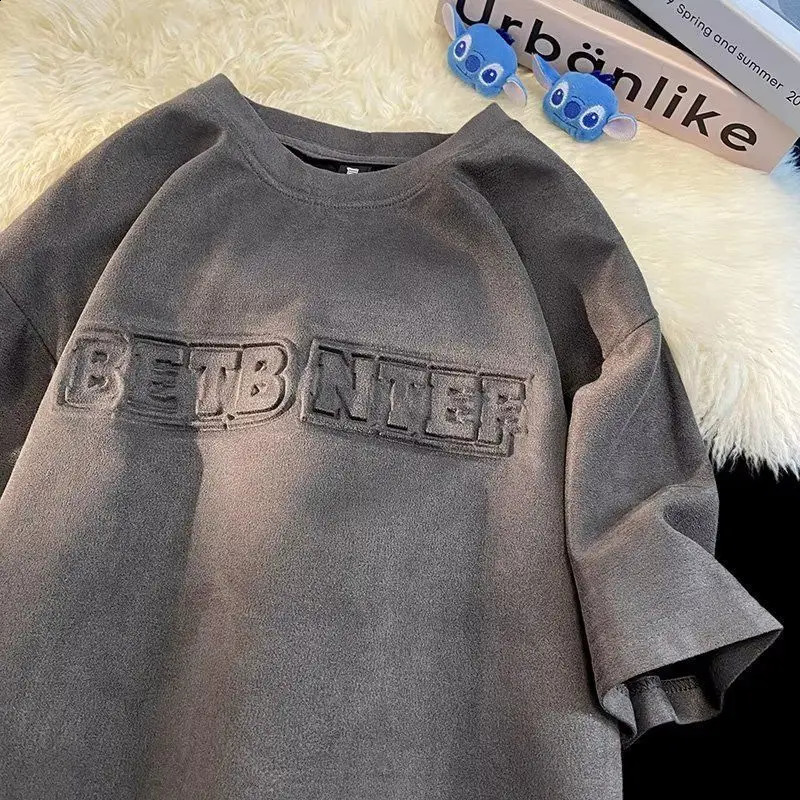 Summer mens and womens fashion personality steel print letter hiphop round neck short sleeved American couple loose casual Tshirt 240821