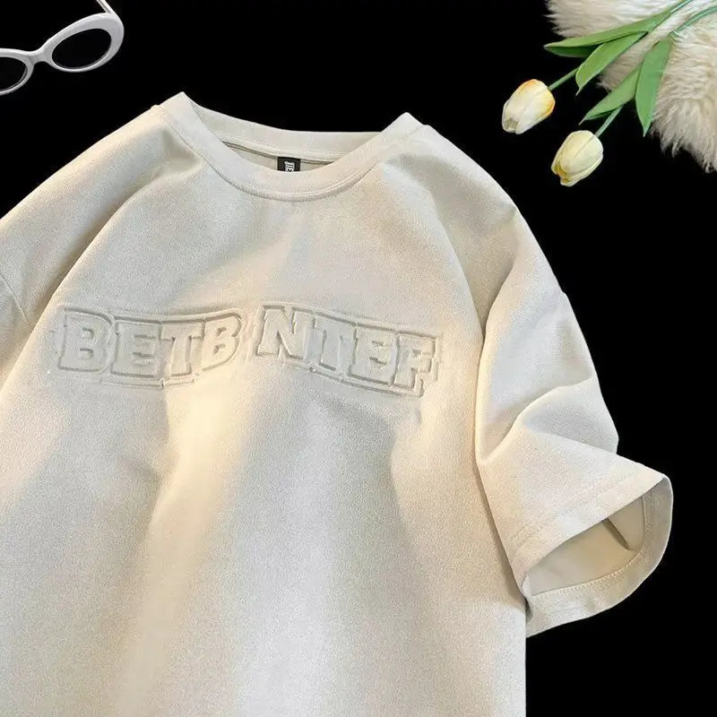 Summer mens and womens fashion personality steel print letter hiphop round neck short sleeved American couple loose casual Tshirt 240821