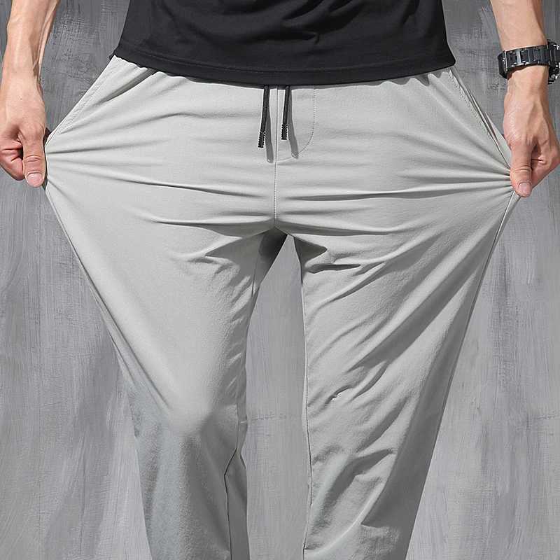 2024 New Silk Elastic Mens Loose 9-Point Large Small Foot Sports Pants SpringW240725