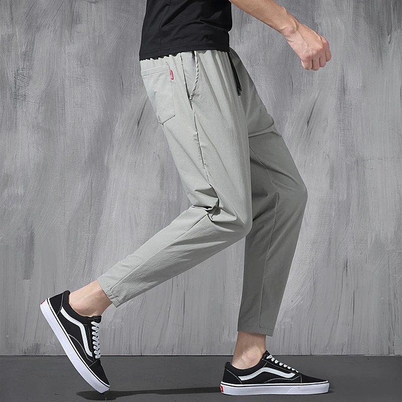 Korean Ice Silk Elastic Trousers Four Seasons Thin Casual MenS Loose 9-Point Large Size Small Foot Sports Pants Spring 240822