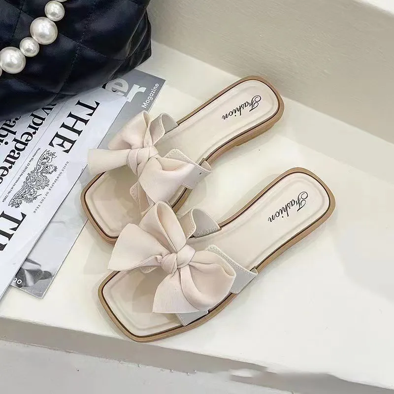 2024 New Bow Slippers for Women's Summer Outwear Fashion Home Flat Bottom Anti slip Fairy Style One line Cool Slippers Soft ecb