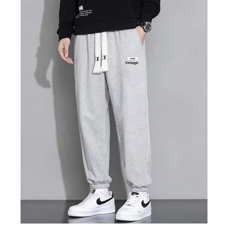 Spring and Autumn Fashion Casual Versatile Oversized Solid Color Tied Feet 9/4 Trendy Loose and Elegant Men Sports Pants 240822