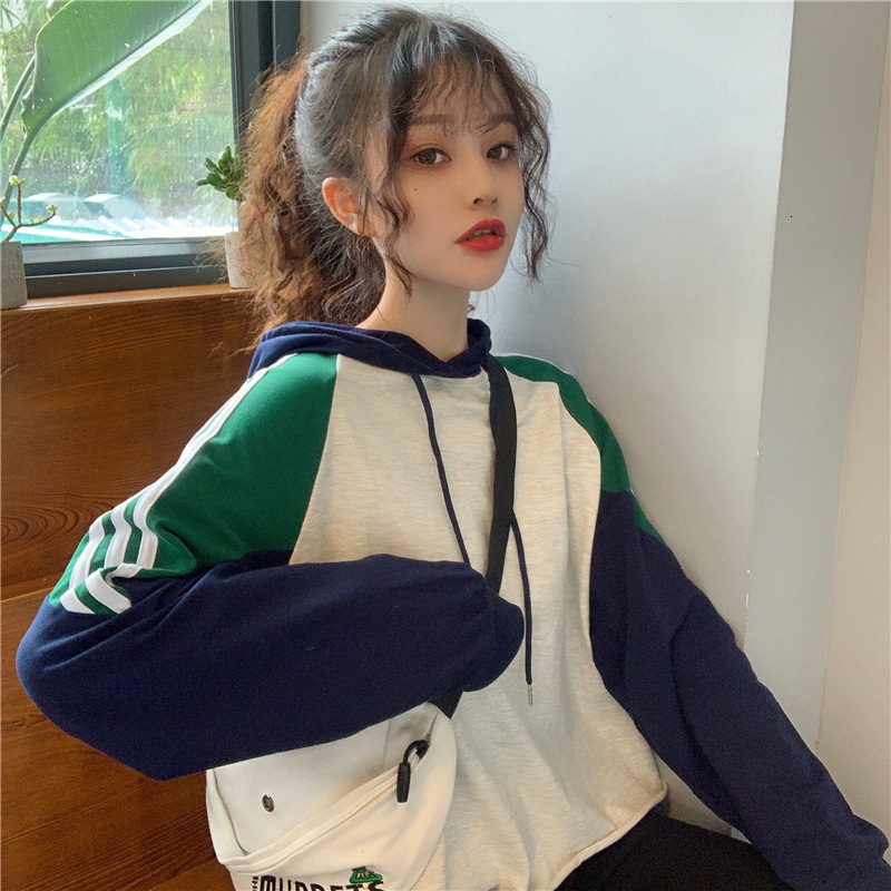 College style color blocked loose striped long sleeved sweatshirt for women in autumn , thin sports pullover hooded casual jacket dongdumaoyi
