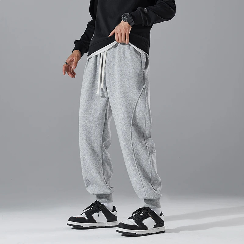 Korean Spring Autumn Mens Solid Elastic Waist Drawstring Pockets High Street Fashion Casual Loose Foot Binding Sweatpants 240822