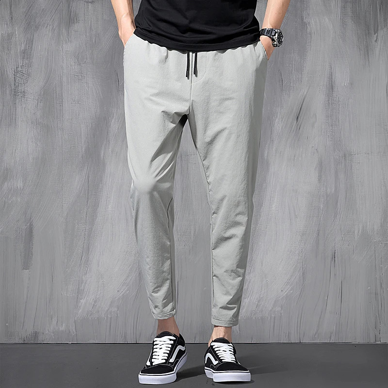 Korean Ice Silk Elastic Trousers Four Seasons Thin Casual MenS Loose 9-Point Large Size Small Foot Sports Pants Spring 240822