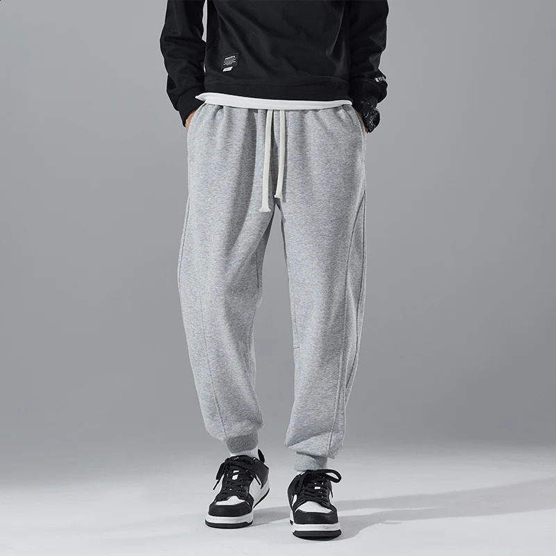Korean Spring Autumn Mens Solid Elastic Waist Drawstring Pockets High Street Fashion Casual Loose Foot Binding Sweatpants 240822