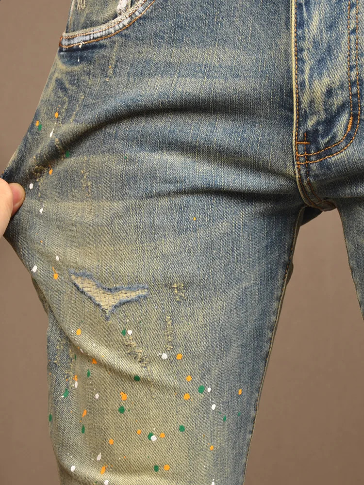 Retro style open top jeans for men in spring and autumn fashion ultra-thin street style Pu Shuai spray painted tight Tappered pants 240821
