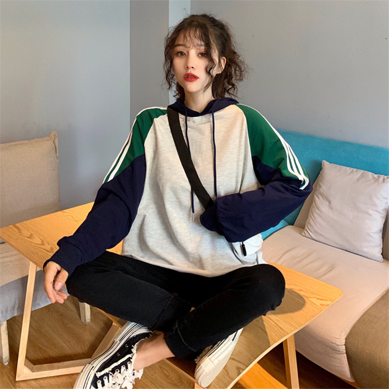 College style color blocked loose striped long sleeved sweatshirt for women in autumn , thin sports pullover hooded casual jacket dongdumaoyi