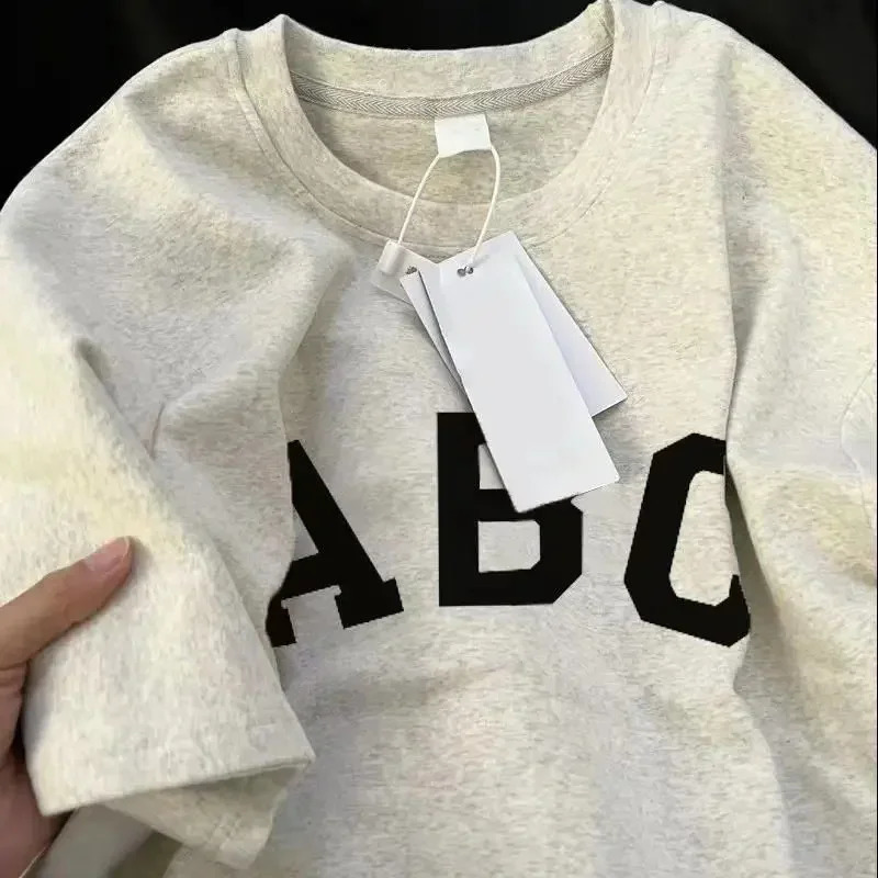 Korean trend letter pattern Tshirt suitable for both men and women high street loose casual simple personalized short sleeved y2k top 240822