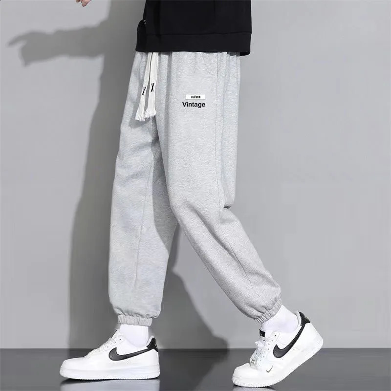 Spring and Autumn Fashion Casual Versatile Oversized Solid Color Tied Feet 9/4 Trendy Loose and Elegant Men Sports Pants 240822