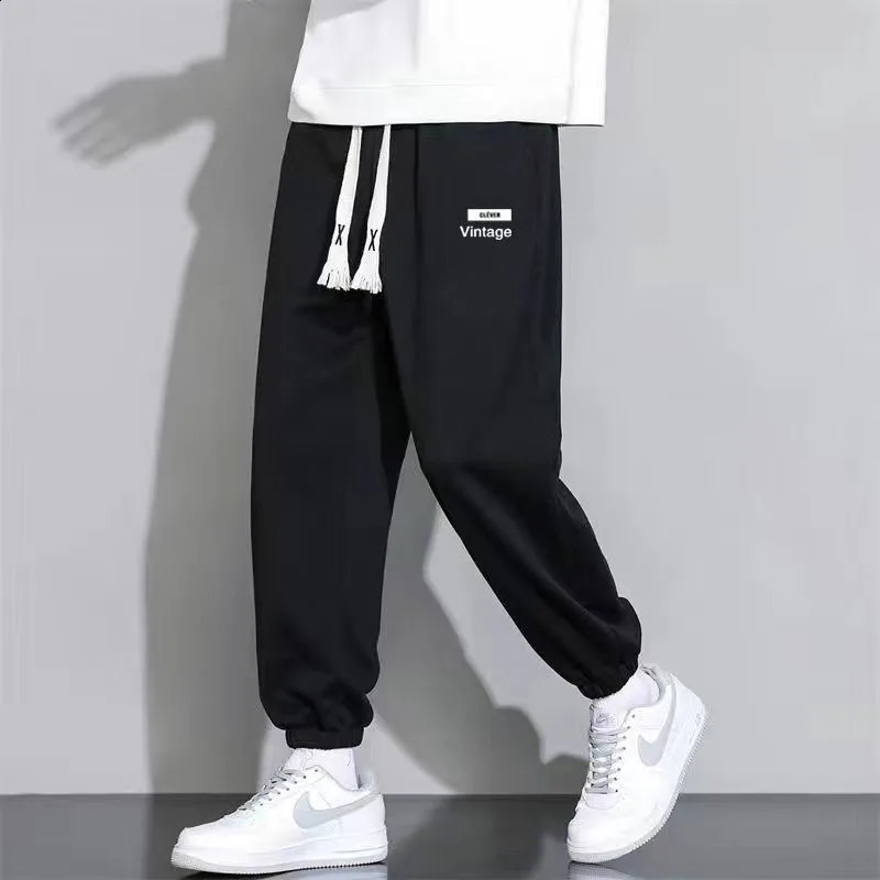 Spring and Autumn Fashion Casual Versatile Oversized Solid Color Tied Feet 9/4 Trendy Loose and Elegant Men Sports Pants 240822