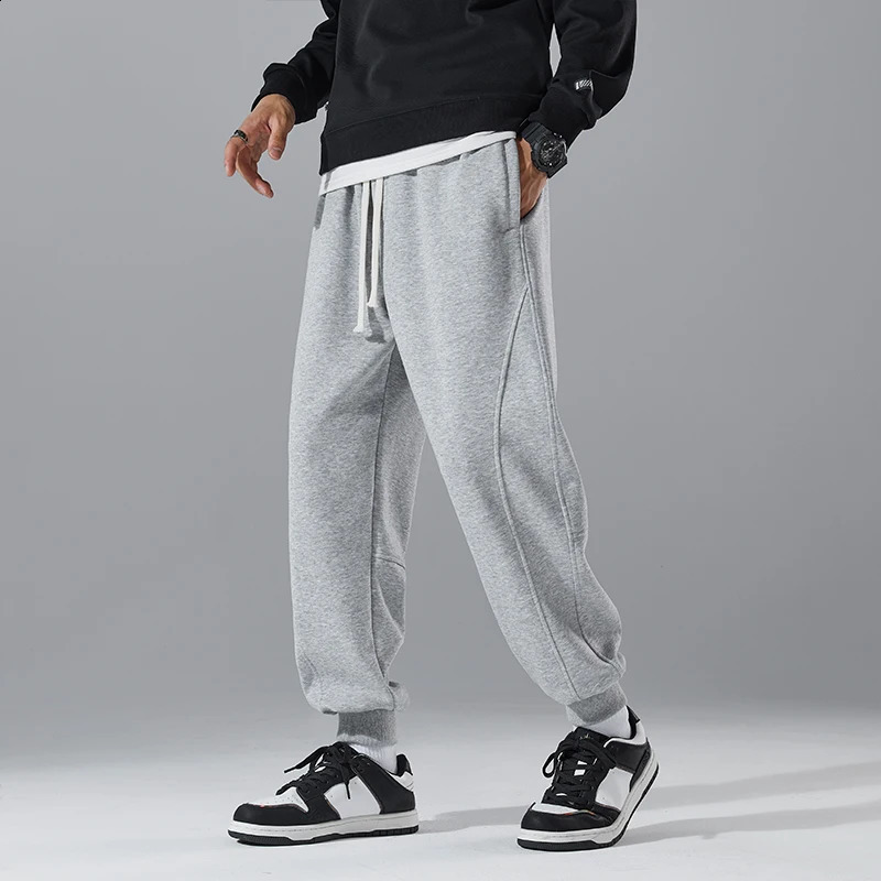 Korean Spring Autumn Mens Solid Elastic Waist Drawstring Pockets High Street Fashion Casual Loose Foot Binding Sweatpants 240822