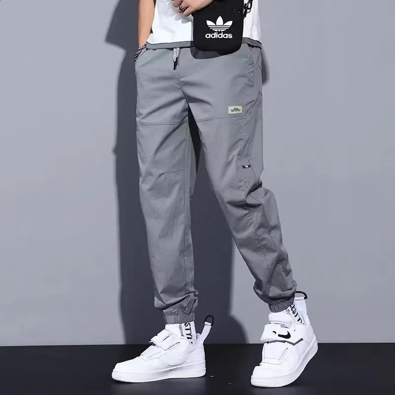 Trend Solid Color Spring Men Loose Bound Feet Work Pants Fashion Youth Solid Color Large Size Casual All-match Pants 240822