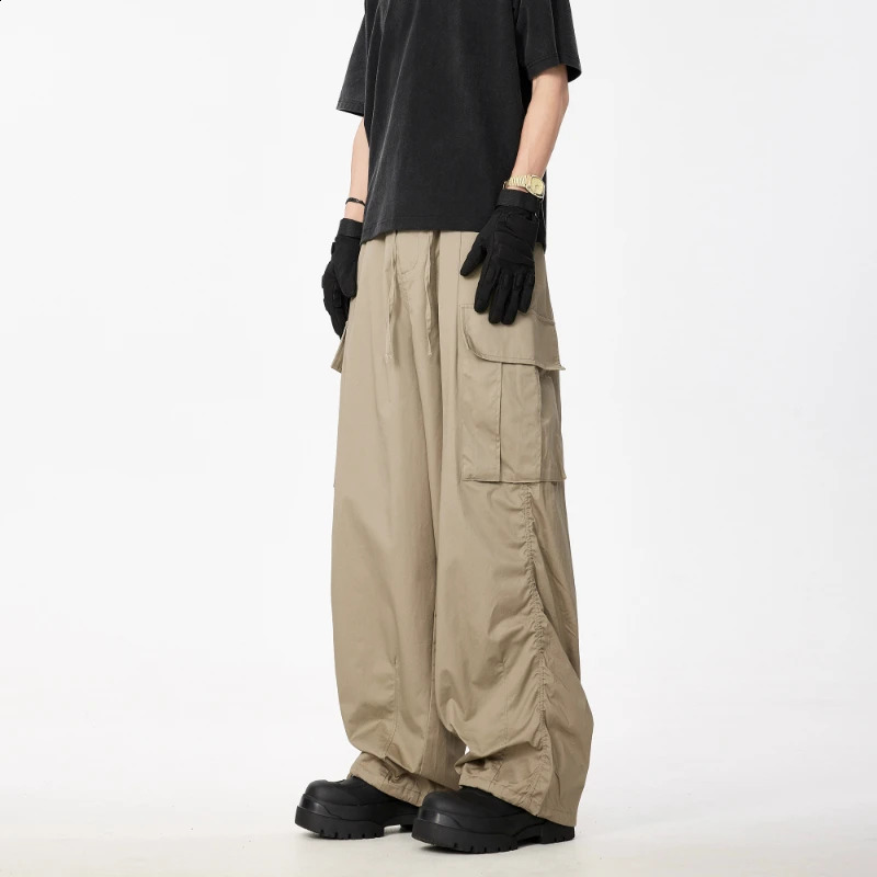 Harajuku cargo pants mens retro hiphop multi pocket solid color pleated loose umbrella unisex casual bottom 240821