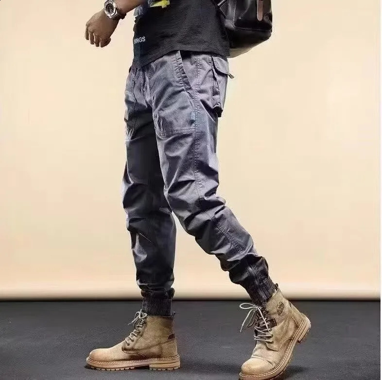 American Retro Outdoor Hip Hop Workwear Pants For Mens Trendy Elastic Waist Zipper Simple Large Pocket Tied Casual Pants 240822