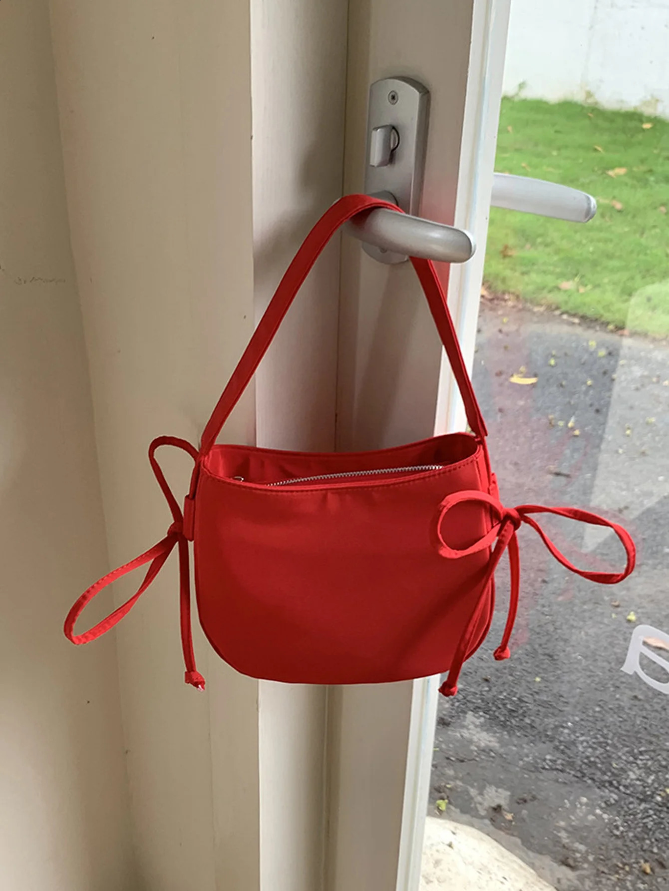 Nylon underarm bag for womens 2024 trendy saddle niche personality highend feeling handheld red 240821