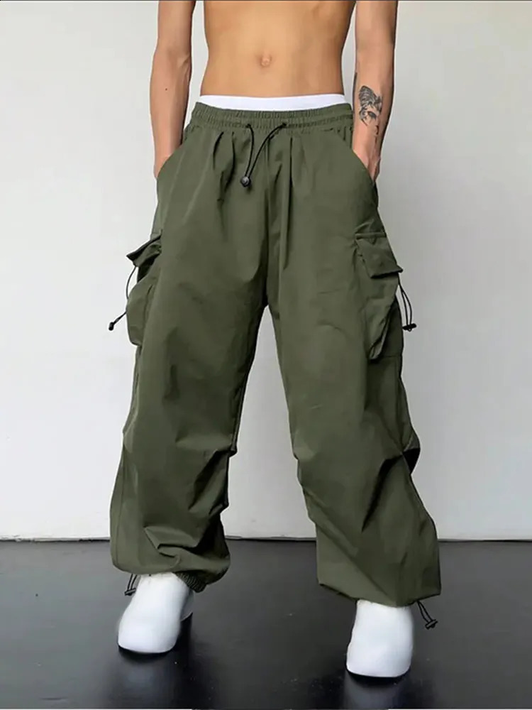 Commodity pants mens solid multi pocket Harajuku casual autumn and winter elastic waist loose street hiphop 240823
