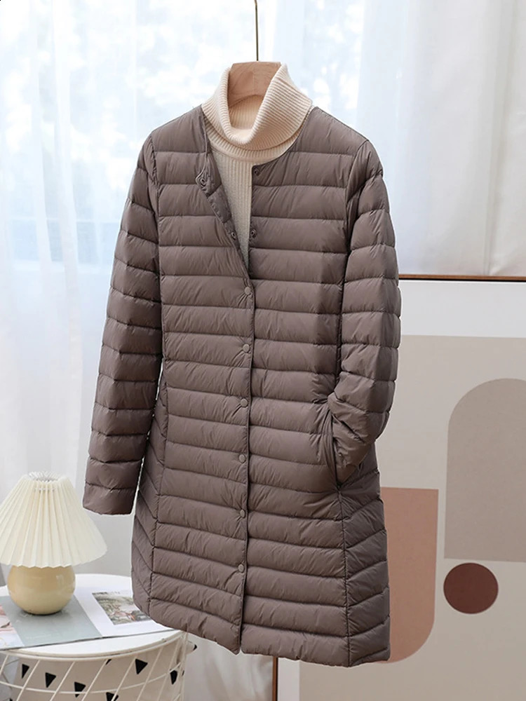 Womens winter coat autumn ultra light duck down jacket Oneck long sleeved inflatable windproof warm lining 240823