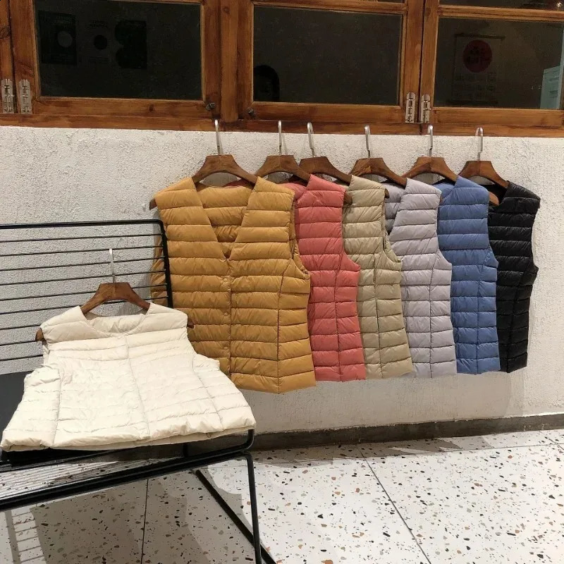 Womens spring sleeveless lined duck down jacket autumn and winter ultra light 90% white womens vest 240823