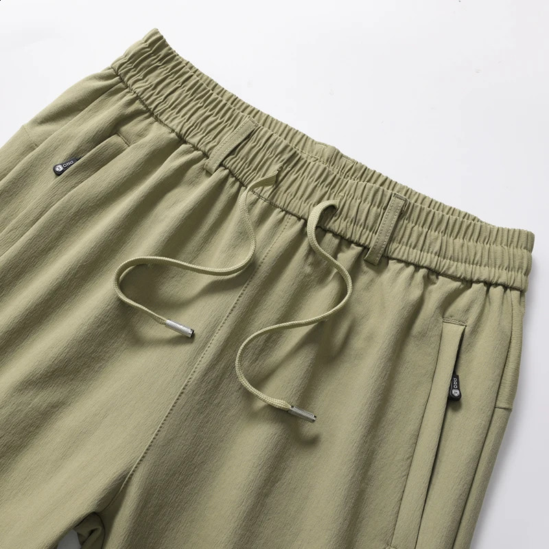 Autumn mens plus size 7XL 6XL business casual high elasticity waist strap elastic nylon spandex straight pants 240823