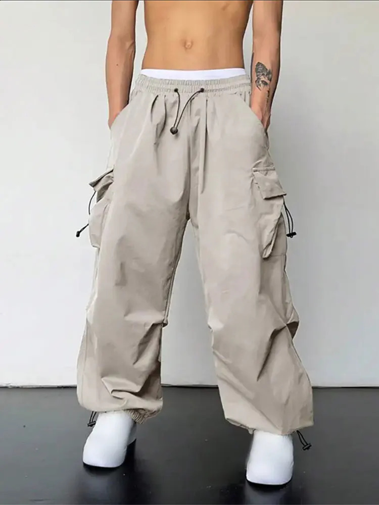 Commodity pants mens solid multi pocket Harajuku casual autumn and winter elastic waist loose street hiphop 240823
