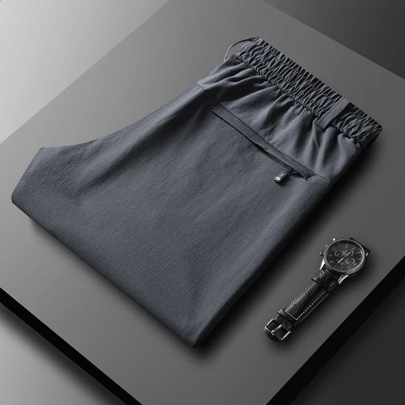 Autumn mens plus size 7XL 6XL business casual high elasticity waist strap elastic nylon spandex straight pants 240823