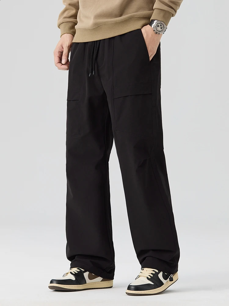 Spring and autumn mens cargo pants outdoor waterproof elastic nylon straight adjustable hem loose fit for runners 240823