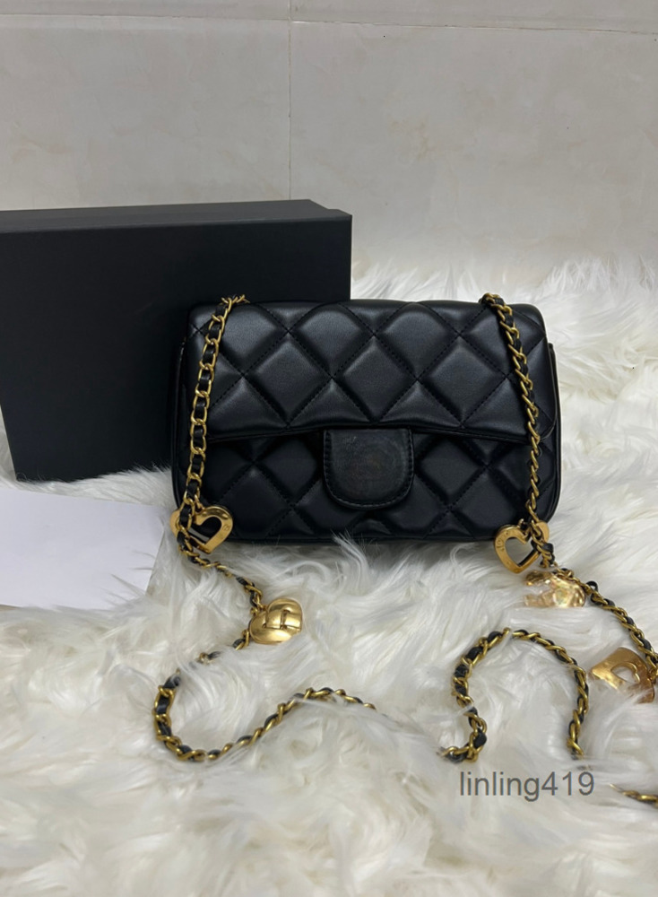 2025 Handbag Luxury Designer bag leather London Women Man Mini Shoulder metal sign pochette clutch tote crossbody chain Bags High Quality