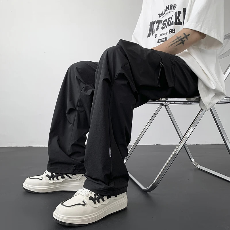 Casual streetwear mens harem jogging pants spring summer autumn solid loose cargo multi pocket wide leg 240823