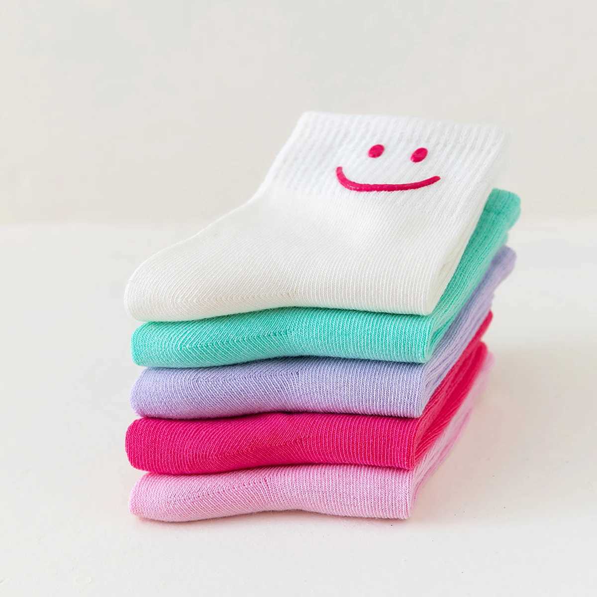 5 pairs of solid colored smiling face dopamine colored mid tube childrens round socks suitable for both men and women CL240824