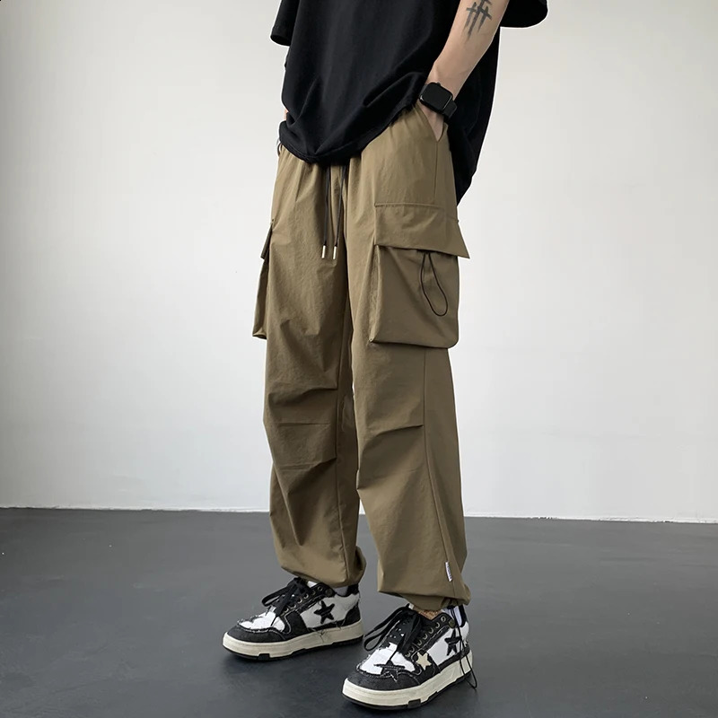 Casual streetwear mens harem jogging pants spring summer autumn solid loose cargo multi pocket wide leg 240823