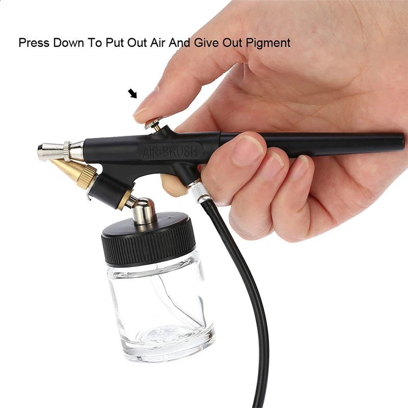 SAGUD 0.8mm spray gun kit with 1/8 interface equipped with a 22cc spray gun cup and air hose component suitable for paint treatment models tattoo cake