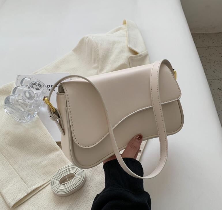 Women New Buckle Shoulder Bag Commuting Work Fashion Simple Style Armpit Bag Handheld Free shipping