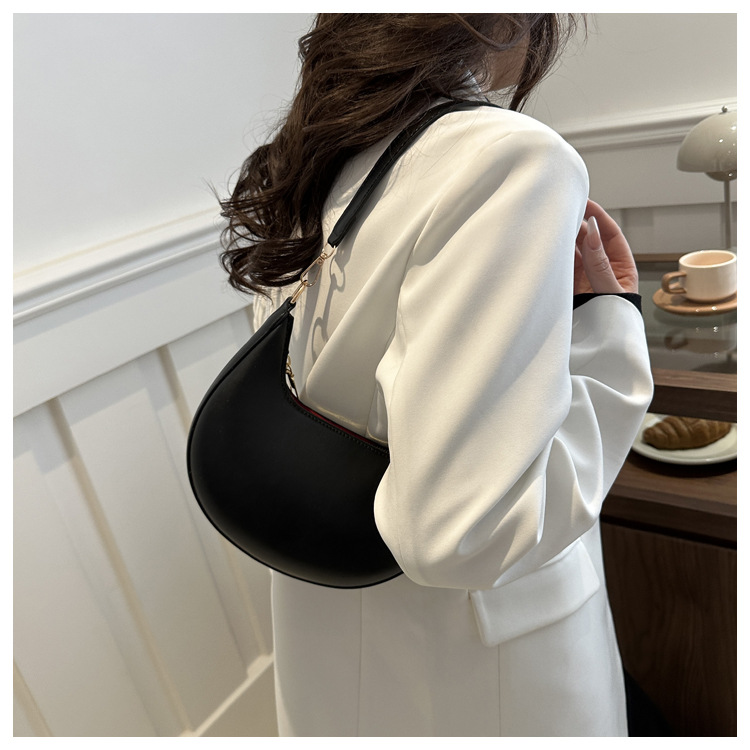 Solid color texture light luxury hand-held crescent retro shoulder bag