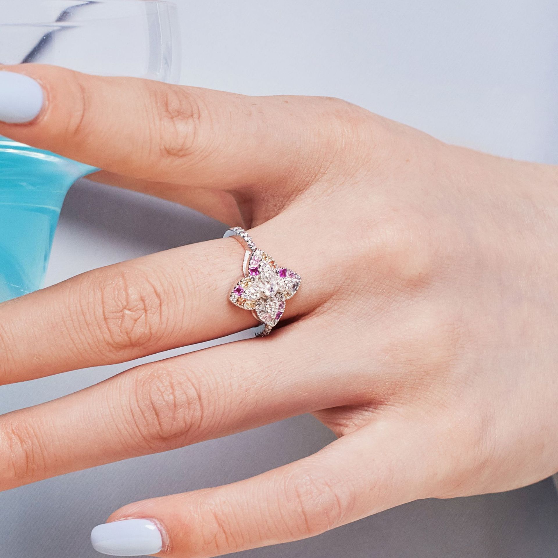 S sterg sier zircon inlaid with candy colored clover design for a refined and elegant closed mouth ring