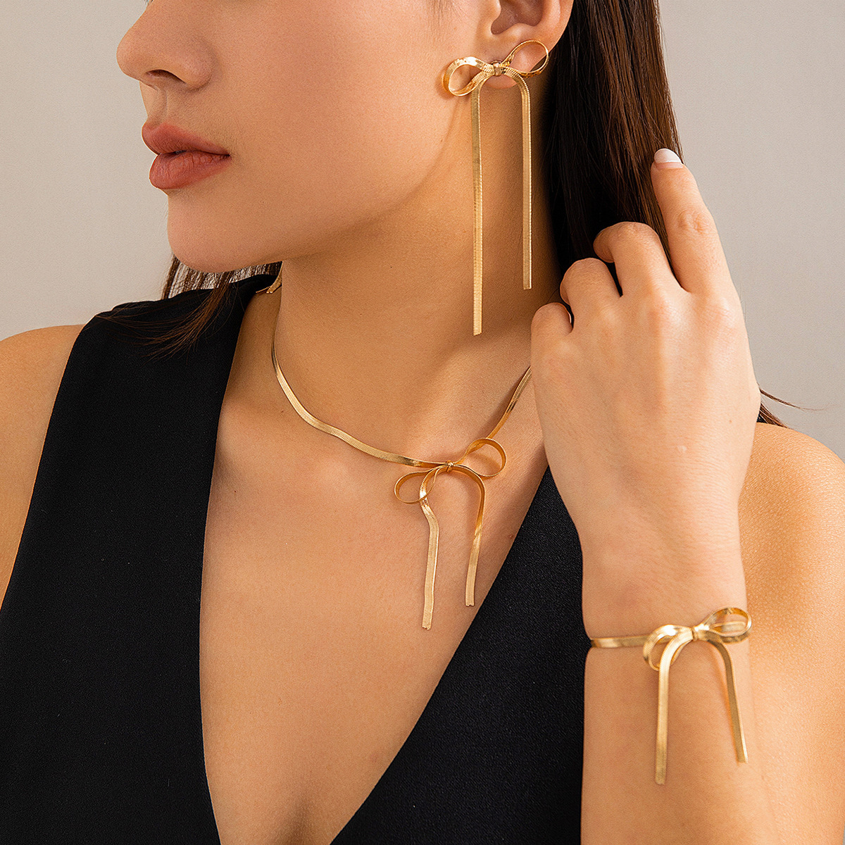 Hot selling BowEarring bow earrings, niche metal ribbon knots, French minimalist earrings