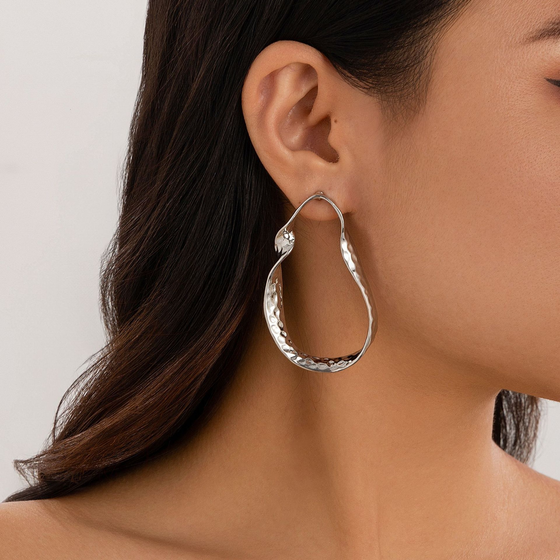 Irregular hollow out twisted circular with geometric alloy and minimalist style earrings